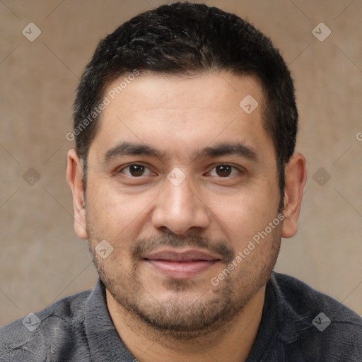 Joyful white young-adult male with short  black hair and brown eyes