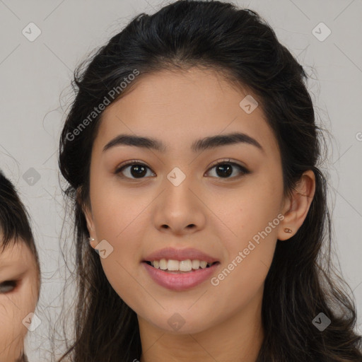 Joyful asian young-adult female with long  brown hair and brown eyes