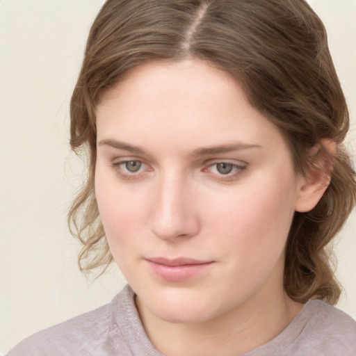 Neutral white young-adult female with medium  brown hair and grey eyes