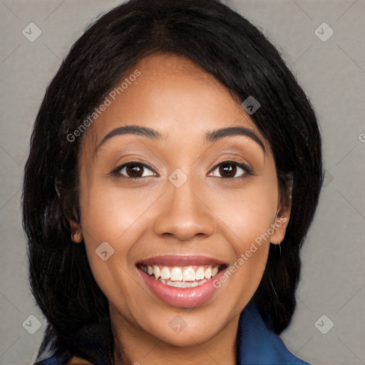 Joyful latino young-adult female with long  black hair and brown eyes