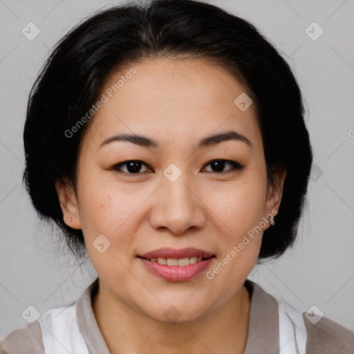 Joyful asian adult female with medium  brown hair and brown eyes