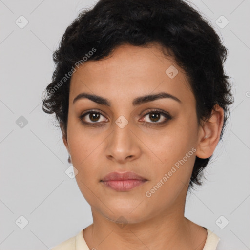 Joyful latino young-adult female with short  brown hair and brown eyes