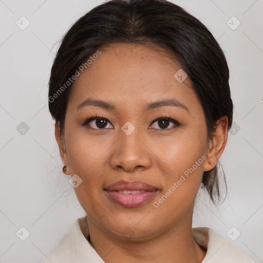 Joyful asian young-adult female with medium  brown hair and brown eyes