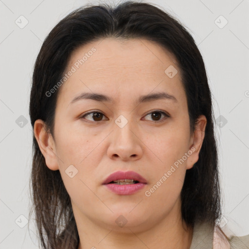 Joyful white adult female with medium  brown hair and brown eyes