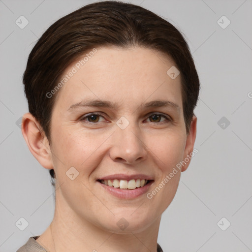 Joyful white young-adult female with short  brown hair and grey eyes