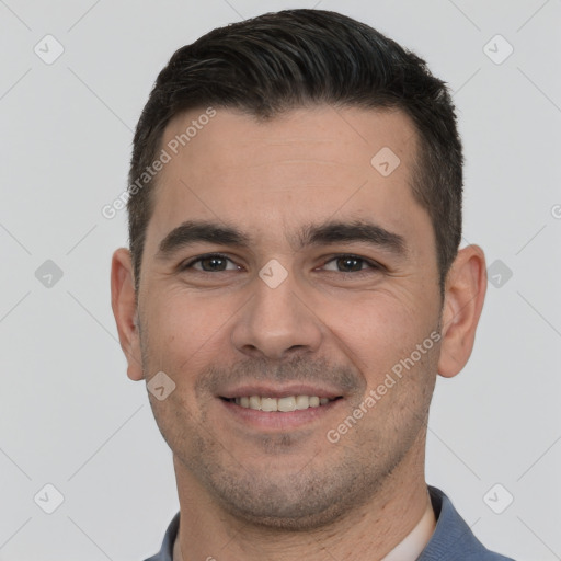 Joyful white young-adult male with short  brown hair and brown eyes