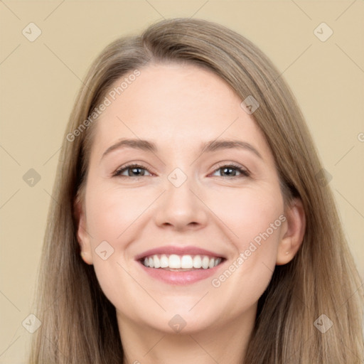 Joyful white young-adult female with long  brown hair and grey eyes