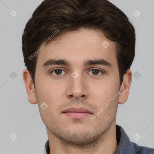 Neutral white young-adult male with short  brown hair and brown eyes