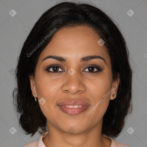 Joyful black young-adult female with medium  brown hair and brown eyes