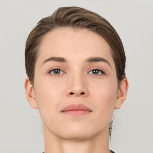 Neutral white young-adult female with short  brown hair and brown eyes