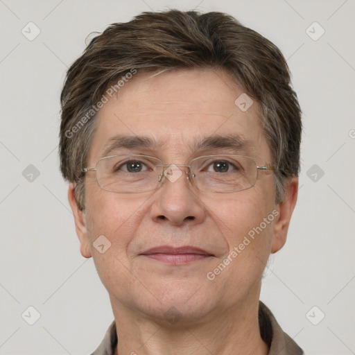 Joyful white adult male with short  brown hair and grey eyes