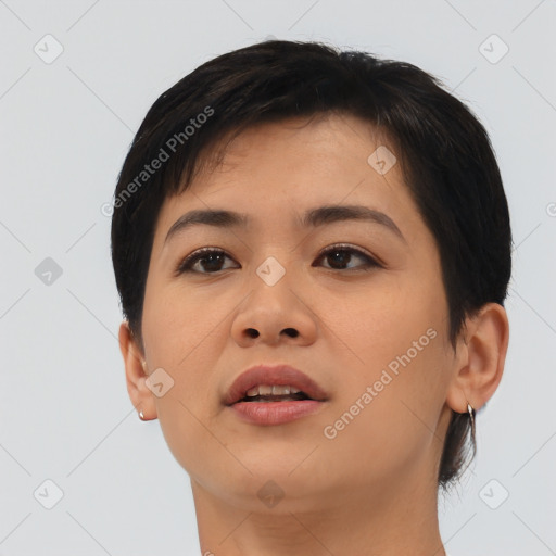 Joyful asian young-adult female with short  brown hair and brown eyes