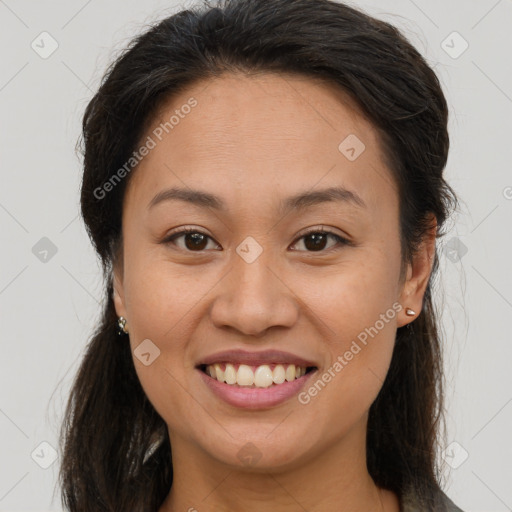 Joyful white young-adult female with long  brown hair and brown eyes