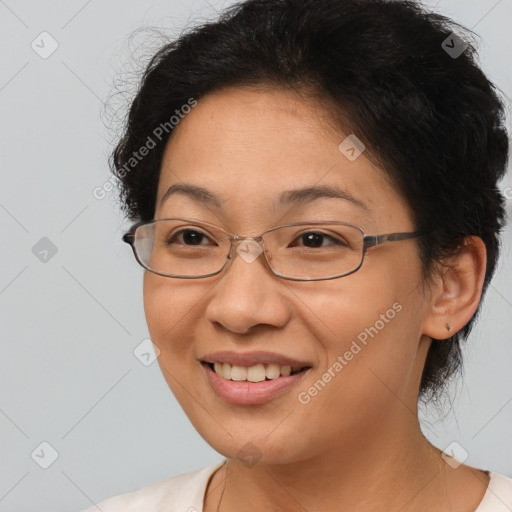 Joyful white adult female with short  brown hair and brown eyes