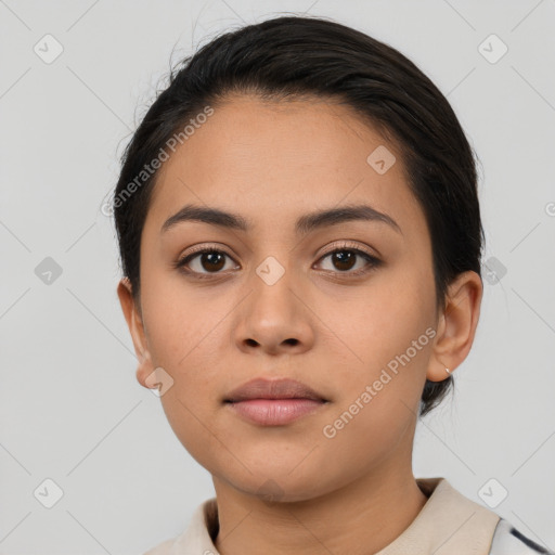 Neutral latino young-adult female with short  black hair and brown eyes