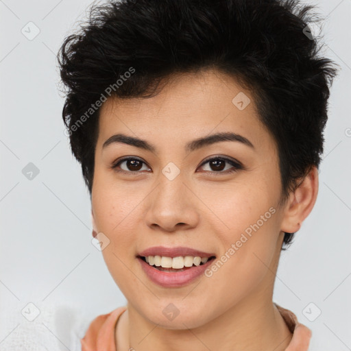 Joyful asian young-adult female with short  brown hair and brown eyes