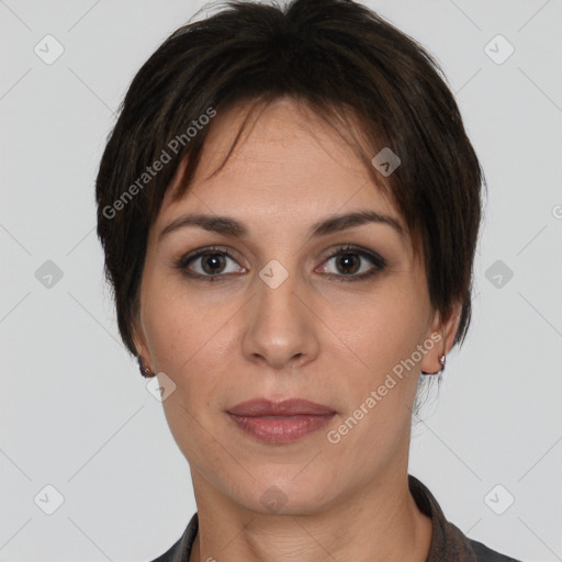 Joyful white adult female with short  brown hair and brown eyes