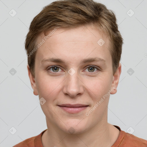 Joyful white young-adult female with short  brown hair and grey eyes