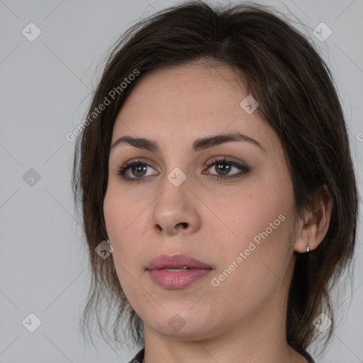 Neutral white young-adult female with medium  brown hair and brown eyes