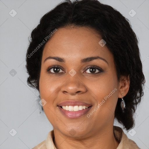 Joyful black young-adult female with medium  brown hair and brown eyes