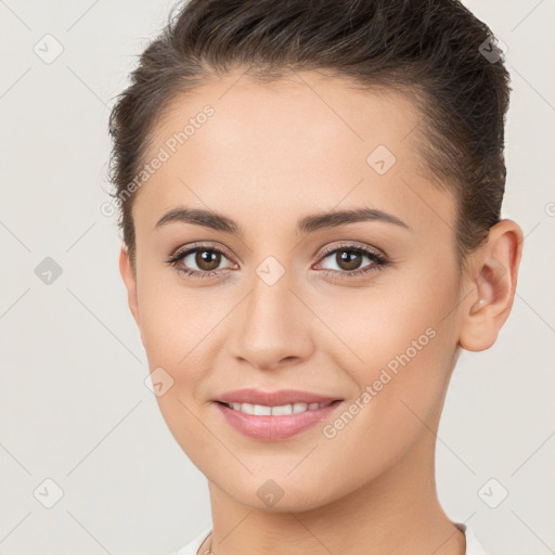 Joyful white young-adult female with short  brown hair and brown eyes