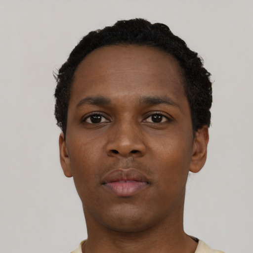 Neutral black young-adult male with short  black hair and brown eyes
