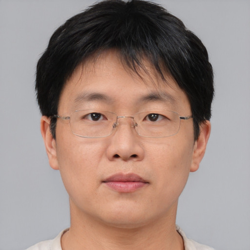 Neutral asian adult male with short  brown hair and brown eyes