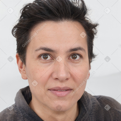 Joyful white adult female with short  brown hair and brown eyes