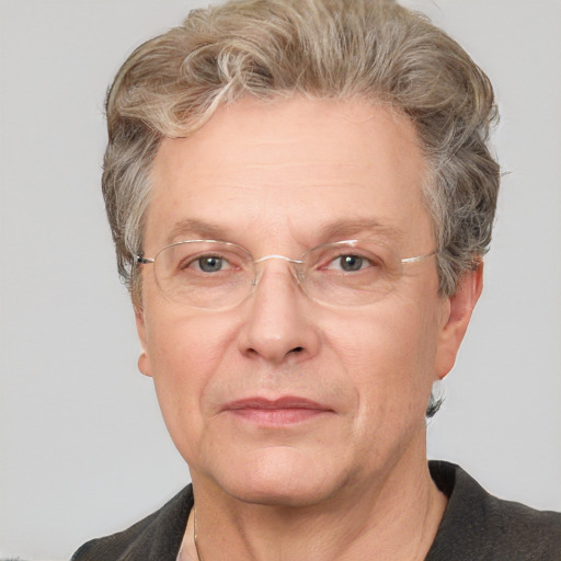 Joyful white middle-aged male with short  brown hair and grey eyes