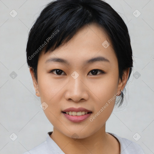 Joyful asian young-adult female with medium  black hair and brown eyes