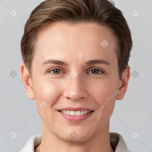 Joyful white young-adult female with short  brown hair and grey eyes