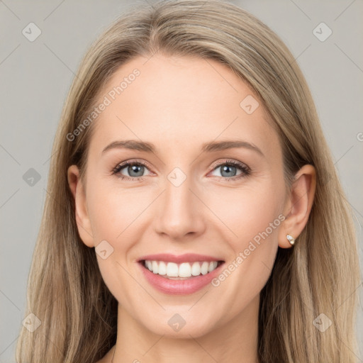 Joyful white young-adult female with long  brown hair and grey eyes