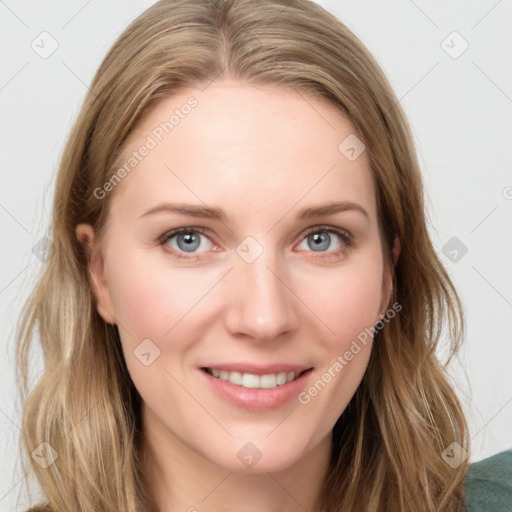 Joyful white young-adult female with long  brown hair and blue eyes