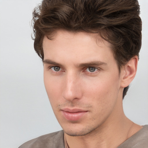 Neutral white young-adult male with short  brown hair and grey eyes