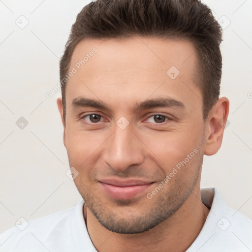 Joyful white young-adult male with short  brown hair and brown eyes