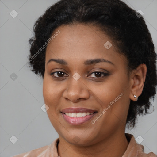 Joyful black young-adult female with medium  brown hair and brown eyes