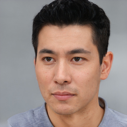 Neutral asian young-adult male with short  black hair and brown eyes