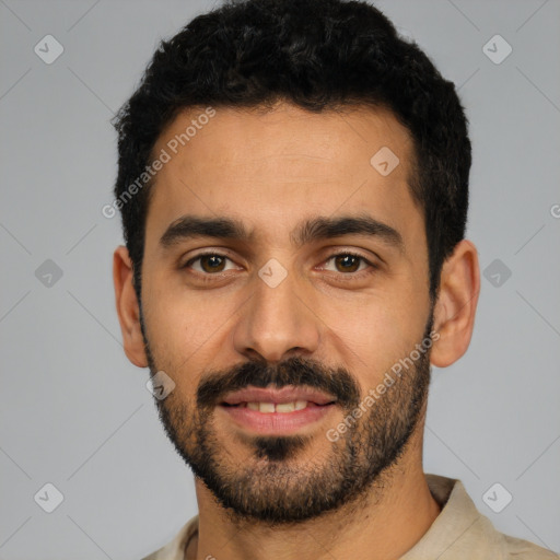 Joyful latino young-adult male with short  black hair and brown eyes