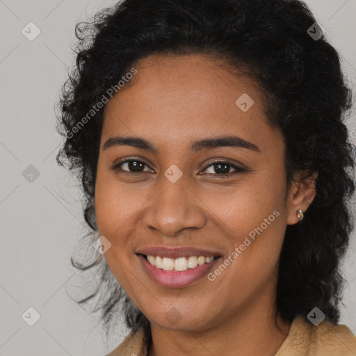 Joyful latino young-adult female with long  brown hair and brown eyes