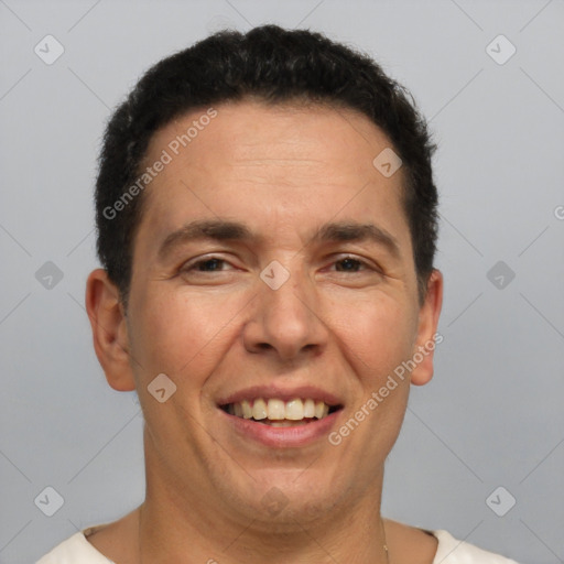 Joyful white adult male with short  brown hair and brown eyes