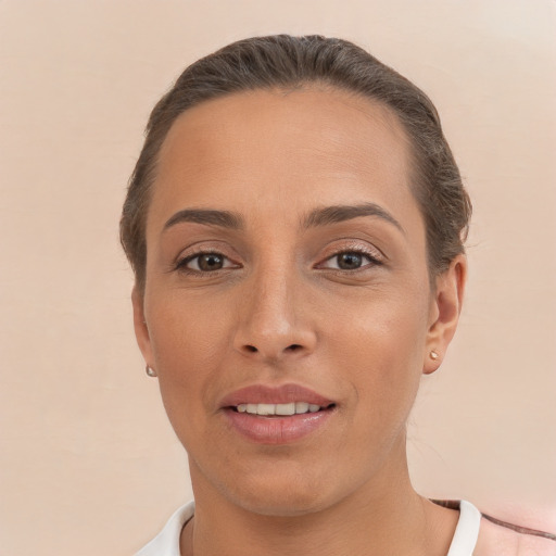 Joyful white young-adult female with short  brown hair and brown eyes