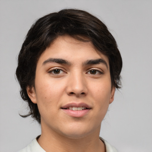 Joyful white young-adult male with medium  brown hair and brown eyes