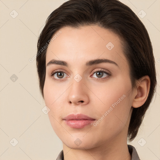 Neutral white young-adult female with medium  brown hair and brown eyes