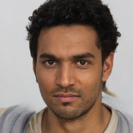 Neutral white young-adult male with short  black hair and brown eyes
