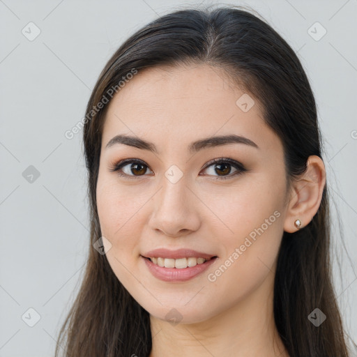 Joyful white young-adult female with long  brown hair and brown eyes