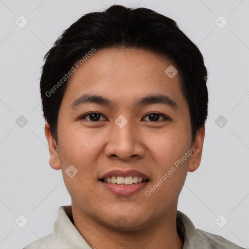 Joyful asian young-adult male with short  black hair and brown eyes