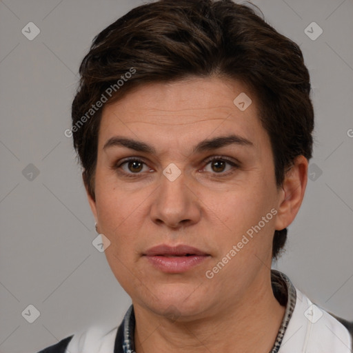 Joyful white adult female with short  brown hair and brown eyes