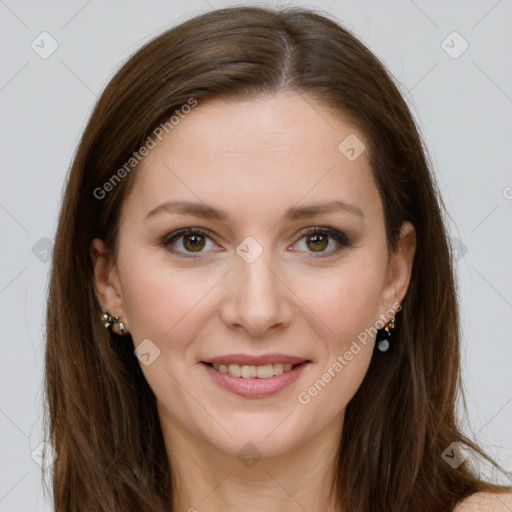 Joyful white young-adult female with long  brown hair and green eyes