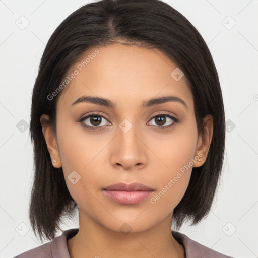 Neutral latino young-adult female with long  brown hair and brown eyes