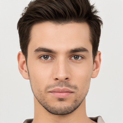 Neutral white young-adult male with short  brown hair and brown eyes